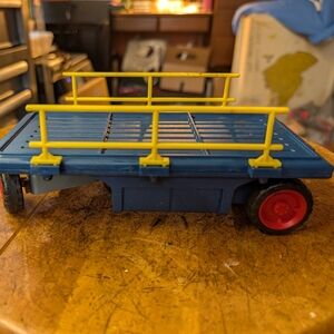 Colorful Toy Cart with Yellow Railings